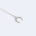 Silver crescent moon pendant necklace with white zirconia on a delicate cross chain - Crescent Moon / Silver