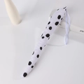Detail of plush Dalmatian spotted tail accessory with elastic loop for kids costume - Dalmatian Tail