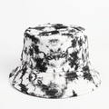 Detailed view of tie-dye bucket hat stitching and black white splatter canvas texture - Black and White