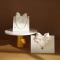 3-piece set of cream white plaster jewelry display stands featuring decorative bows - Display Set 3 (3 PCS)