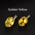 Elegant leverback earrings featuring oval-cut golden yellow cubic zirconia stones - Gold Yellow