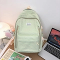 Mint green bubble fabric backpack with quilted texture and cute white rabbit keychain - Green