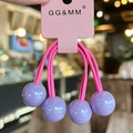 Pink elastic hair tie set with four glossy purple beads on a decorative card - Violet