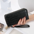 Women's black crocodile pattern long PU leather wallet with double zippers and wristlet - Black