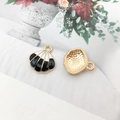Golden shell-shaped metal pendants with black and white enamel stripes for DIY jewelry making - Textured Shell