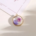 Golden round resin pendant with purple dried flower petal and alloy frame for DIY jewelry - Style 13