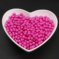 Vibrant rose red ABS imitation pearls in a white heart ceramic tray for DIY jewelry - Rose Red