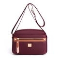 Waterproof nylon crossbody bag in wine red with multi-zipper pockets and gold hardware - Dark Red