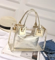 Transparent PVC jelly beach bag with golden handle and interior pouch for summer - Gold
