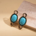 Detail view of retro oval turquoise resin earrings with antique gold rope borders on stone - Earrings (Silver Earring Post) / Blue