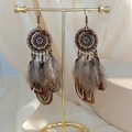 Detail of bohemian dreamcatcher earrings with natural feathers and beads on a gold stand - Brown Feather Bronze Style(E6318)