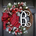 Christmas wreath with red berries, pinecones, plaid bow, and letter B on wooden door - 30cm American Style Letter B Wreath / 30cm