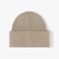 Neutral beige winter beanie featuring thick ribbed knit and fuzzy sherpa cuff texture - Khaki