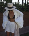 Witte strandset voor dames met oversized vest met lantaarnmouwen en gestreepte short - S / Wit