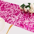 Detailed macro view of rose red foil mesh table runner with metallic lace texture - Rose Red