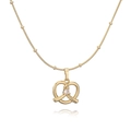 Golden pretzel heart necklace with clear zircon stone on a beaded chain with reflection - Single Zirconia Pretzel Necklace / Gold