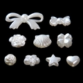 White baroque faux pearl bead assortment in bow, rose, and heart shapes for DIY - Mixed