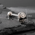 Silver skull tongue ring in stainless steel with 0.96cm height on dark stone base - Realistic Skull Style (S252)