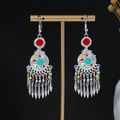 Detailed view of bohemian dangle earrings with colorful beads and silver metal tassels - E1108-1 Multi Bead