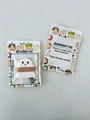 White ghost-shaped air cushion phone holder with cartoon packaging in white finish - Ghost 6 + Packaging Bag