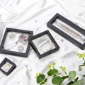 Black square and rectangular PE film suspension jewelry boxes with items inside - 5x5cm / Black