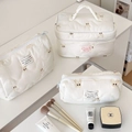 Three-piece white quilted makeup bag set featuring cute bear embroidery and fabric label - White Rabbit