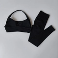 Flachbild-Ansicht des nahtlosen Sportsets mit Neckholder-BH und High-Waist-Leggings - S / Schwarz