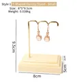 7-shaped jewelry display stand with golden metal frame and wooden base for earrings - 7-Shape Earring Stand - Small