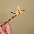 Close-up of wooden hair pin with golden maple leaves and delicate pearls - Golden Maple (S387)