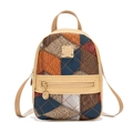 Mini Rucksack aus mehrfarbigem Kunstleder-Patchwork mit Krokodil- und Lychee-Struktur - Aprikose