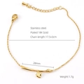 Pulsera de acero inoxidable chapada en oro de 18K con corazón y barra curvada - Oro de 18K / Dorado