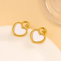 Golden heart earrings with white enamel inlay displayed on a white ceramic plate - White Enamel Heart Stud Earrings (CK1396)