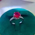 Detail of 2 carat red ruby ring with six-prong setting in a green velvet jewelry box - A8 Open Type / Red