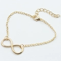 Elegant gold infinity symbol bracelet with adjustable link chain and lobster clasp - Large Infinity Symbol (Large KC Gold 8573)