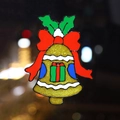 Glittery gold Christmas bell sticker with red bow and holly for glass window decor - Bell