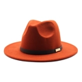 Close-up of wool fedora hat in burnt orange with black band and gold metal buckle detail - M (56-58cm) / Caramel color