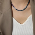 Minimalist titanium steel gold-plated necklace with iridescent chain links on a model - Wide 6.3mm Necklace (P1634) / Rainbow