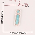 Mint green embroidered letter I patch with beige borders measuring 2.5cm by 0.8cm - Letter-I