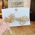 Elegant amber crystal butterfly hair clip with gold alloy base and white rhinestones - Butterfly Knot Champagne Spring Clip