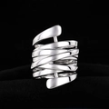 Minimalist silver wide multi-layer wrap ring with flowing geometric lines on black velvet - US 5 / White Gold