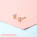 Boucle d'oreille fleur dorée minimaliste avec zircone et mesure de 0,5 cm de long - Fleur en Fleur