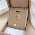 Elegant gold celestial necklace featuring crescent moon and dangling star pendants in Y-shape - Crescent Star Pendant Gold (N303)