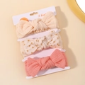 Detailed set of three ribbed baby headbands featuring floral and solid bow designs - Beige Floral Coral Pink Headband (3D)