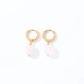 Macro detail of geometric natural stone earrings with gold finish and pink pendants - Gold + Light Pink Stone