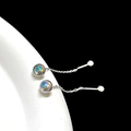 Macro detail of silver moonstone tassel earrings with long chains on white curved stand - Moonstone Tassel / Steel Color - Moonstone Tassel (Single)