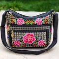 Ethnic black canvas crossbody bag with colorful floral embroidery and multiple zipper pockets - Red Plum Blossom