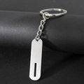 Polished silver stainless steel keychain with oval tag and chain on black texture - Letter I