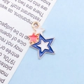 Star-shaped metal pendant with red, white, and blue enamel and gold-plated edges - Enamel US Flag Star / 12x17mm