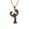 Detailed view of lobster pendant with multicolored crystals on a gold chain necklace - Gold Colorful Lobster O-Chain