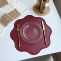 Dark red floral leather place mat with scalloped edges under a clear glass plate - Flower / Burgundy